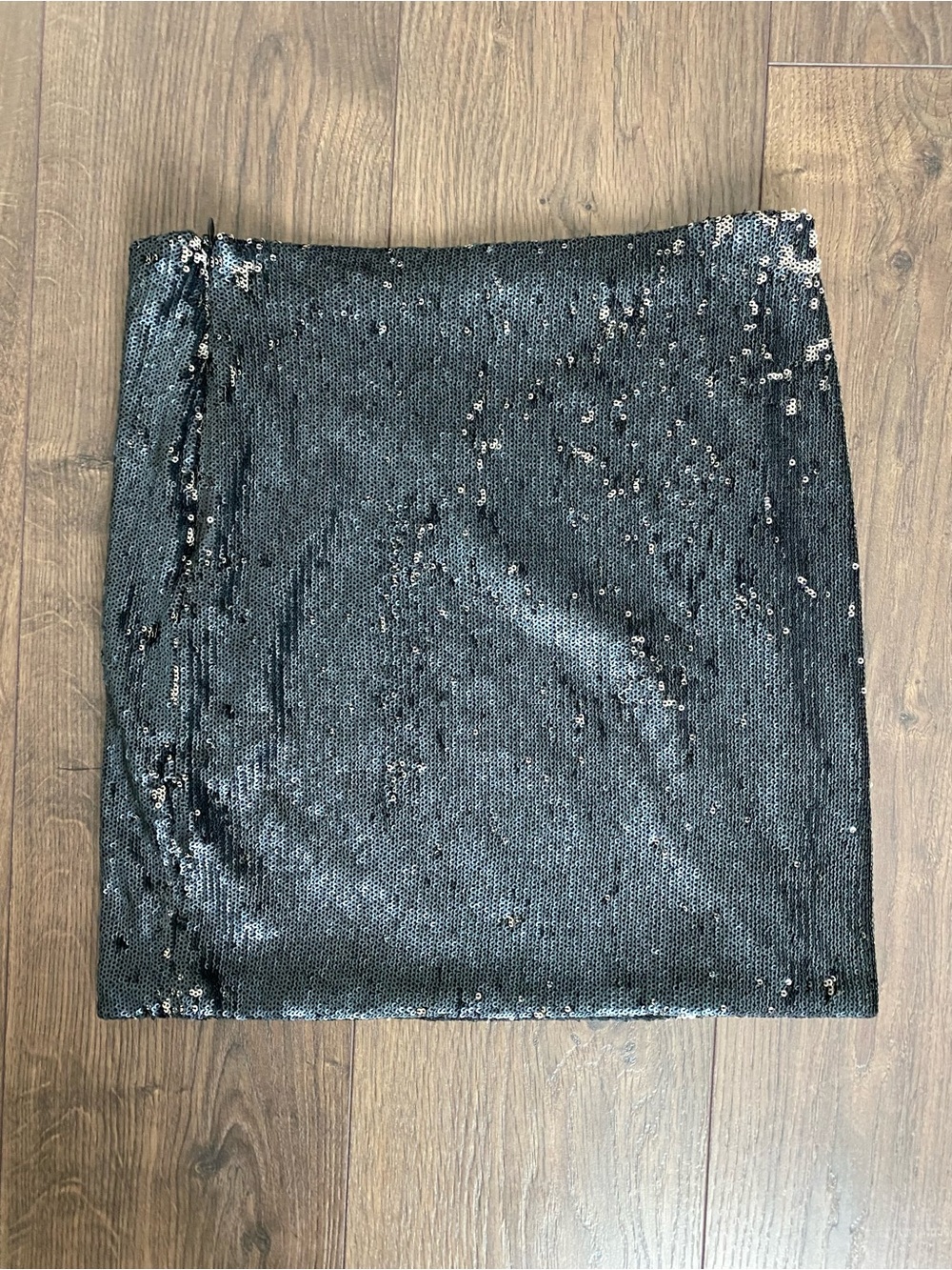 Sequin Kiwi Tucker Mini Skirt in Black